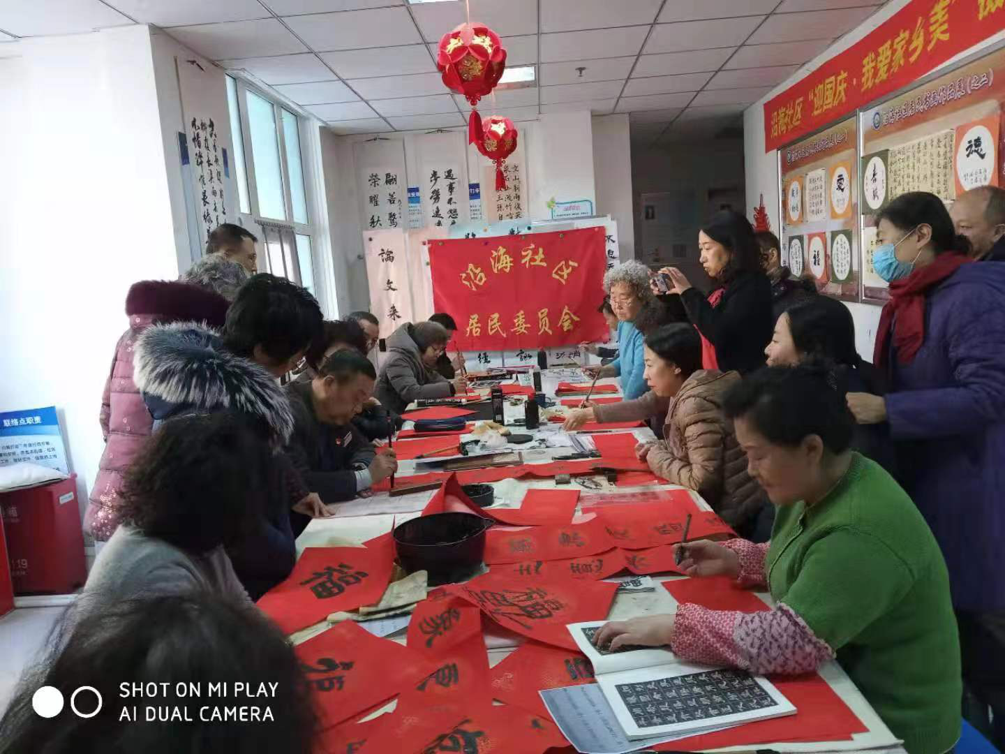 “写春联 送祝福”——沿海社区举办迎新春送春联活动