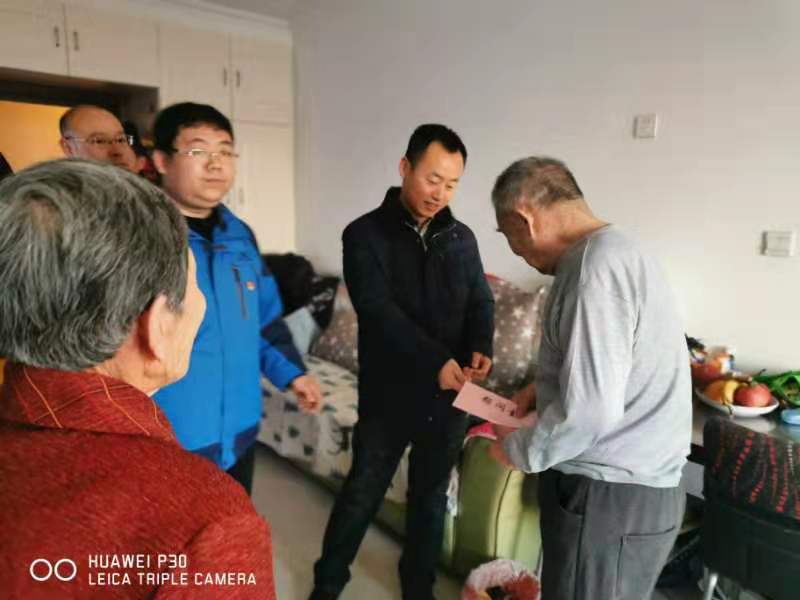 春节走访慰问,情暖困难党员