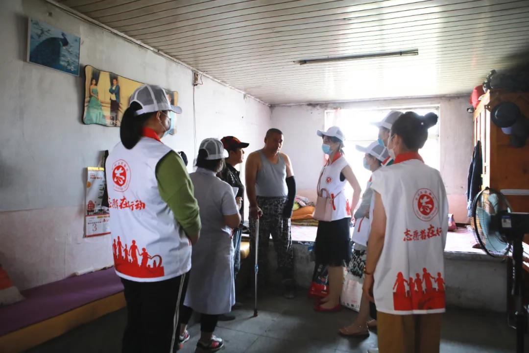 我区开展“扶残帮困送温暖”志愿服务活动