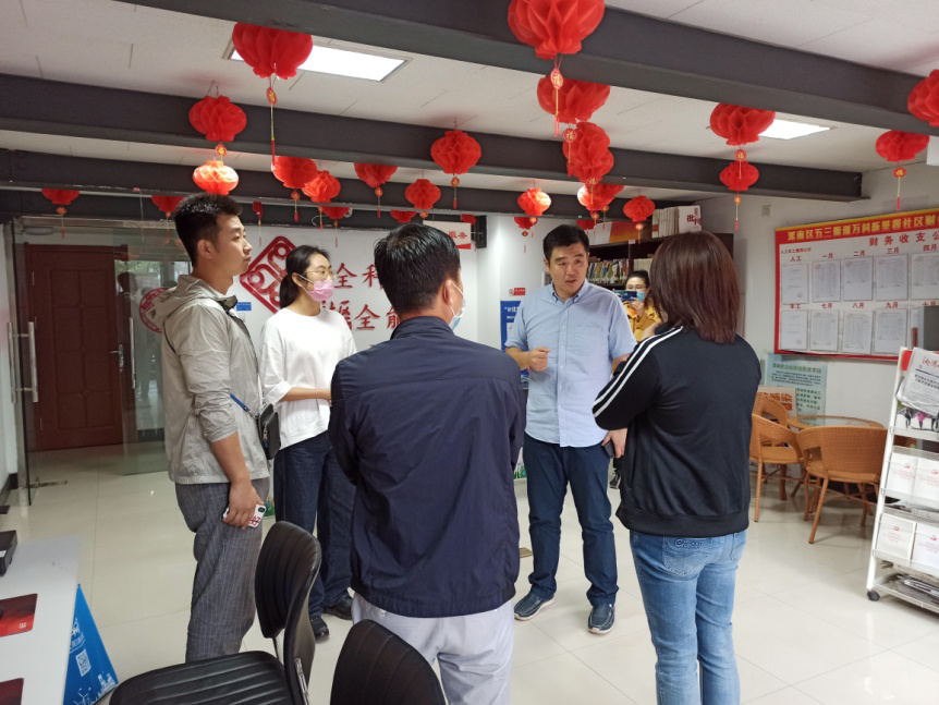 市委网信办到万科新里程社区走访对接