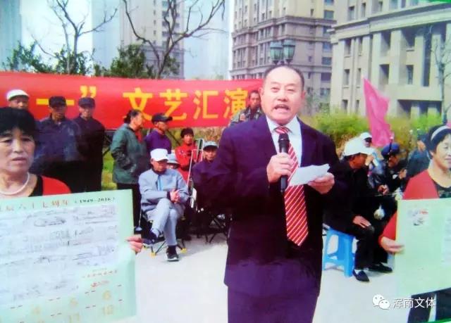 浑南67岁老人画12米长现代版