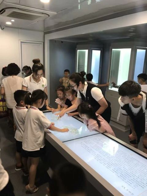 白塔街道上青社区举行流动博物馆进社区活动