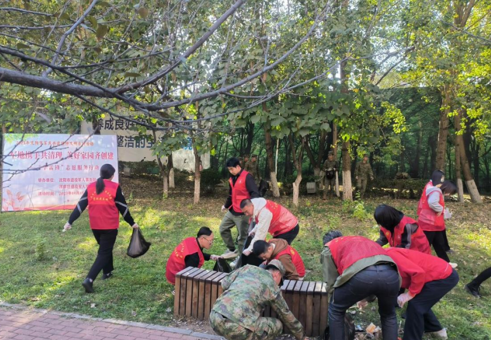 区退役军人事务局开展“军地携手共清理 美好家园齐创建——‘学雷锋’志愿...